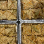 Potato Puffs - potato puffs baked in a puff pastry dough. Sold by the dozen.