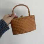 Bottega Veneta top handle clutch